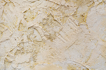 Abstract texture of surface covered with putty. Grain and noise effect. Wall background covered with putty.
