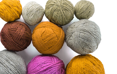 Skeins of wool yarn in threads for knitting clothes. The texture of the wool yarn.