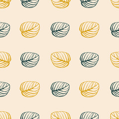 Seamless pattern of yellow and green leaves on a pink background. Autumn template for printing on textiles, fabric, bedding, wrapping paper, covers, wallpaper. 