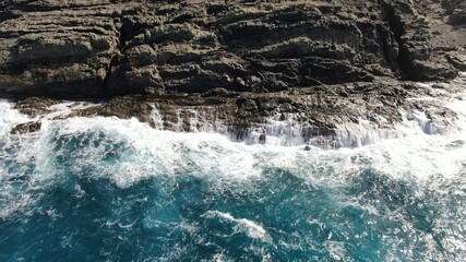 The sea hits the cliffs