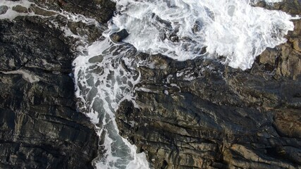 The sea hits the cliffs