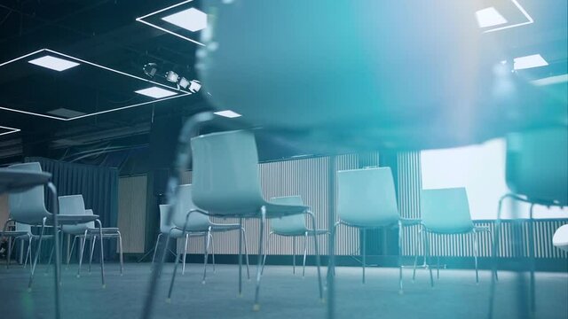empty modern conference hall with preventive distance between seats, no people