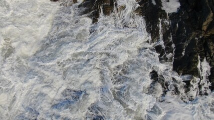 The sea hits the cliffs