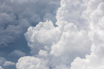 Naklejka na ściany i meble Clouds as seen from an airplane window