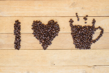 top view of coffee bean sort to Love coffee word