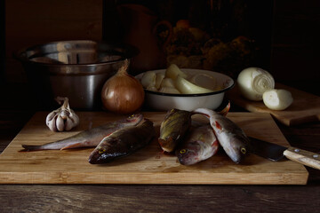 Fresh fish on a wooden table.