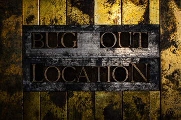 Bug Out Location text on vintage textured silver grunge copper and gold background