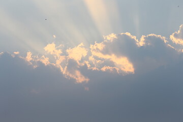 sun rays and clouds