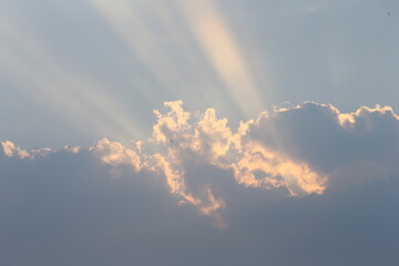 sun rays and clouds
