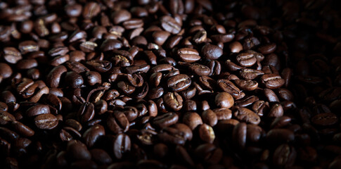 Roasted coffee beans background.