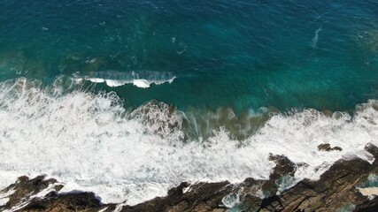 The sea hits the cliffs