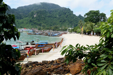 Phi Phi Island, Thailand, October 14, 2018: Thai longtail boats constructed with teak wood have...