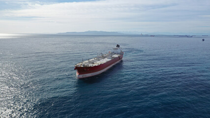 Aerial drone top down photo of latest technology in safety standards crude oil tanker cruising open ocean deep blue sea
