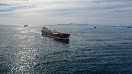 Fototapeta premium Aerial drone photo of latest technology in safety standards crude oil tanker cruising Mediterranean deep blue sea
