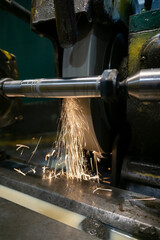 External grinding of a cylindrical shaft on a cylindrical grinding machine.