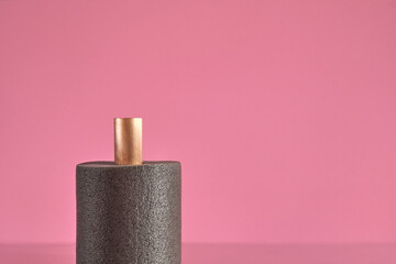 Thermal insulation covering copper tube closeup, pink background, copy space.