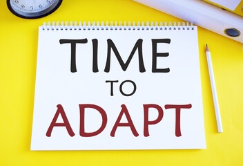 Time to Adapt text written in notebook.Concept meaning Moment to adjust oneself to changes Embrace...