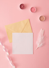 Letter and white paper with pen. Romantic vertical composition with candles and decorative ribbon.Love concept ,flat lay.