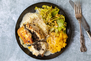 Chicken balmoral, stuffed with haggis with tatties and neeps, Burns Night meal