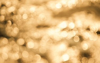 Abstract orange or gold bokeh background 