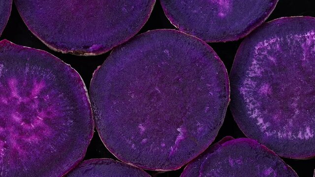 close up slice purple yam potato