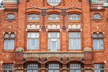 Fototapeta na wymiar Brick red Art Nouveau building of Institute of Physiology. Helsinki, Finland.