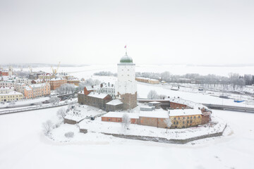 Vyborg castle in winter photo top view. Snowy weather.