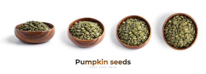 Pumpkin seeds in wooden bowl isolated on a white background.