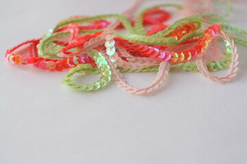 Decorative ribbon with sequins. Braid for sewing clothes for gymnastics, for theatrical costume.