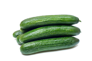 Green cucumbers on white background