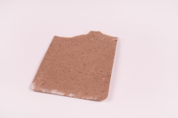 front view of a brown rectangle with a jagged edge
