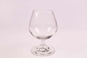 side view of white transparent empty wine glass
