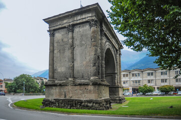 Fototapeta na wymiar In 25 BC. E. in the valley of Aosta, the Romans defeated the warlike tribe of Salassi, who were blocking their way to Gaul. Then the Gallic road was laid and a thriving city arose on it. 