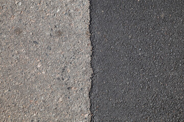 line between old and new asphalt on the road