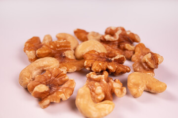 cashews and peeled walnuts close up