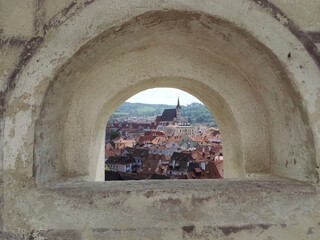 Český Krumlov, Czech Republic, panoramic view over old part of town through wall window