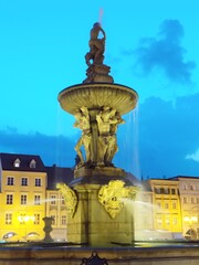 Czech Republic, Češke Budjejovice, fountain in the main square at dusk