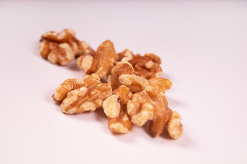 a bunch of peeled walnuts photo taken at an angle