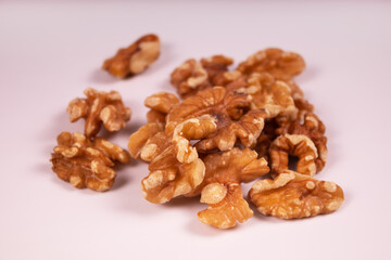 Fototapeta na wymiar a bunch of peeled walnuts close up
