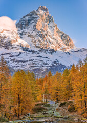 Blue Lake and the surroundings area during the fall and changing of the colors. Foliage, reflection and snowy peaks.