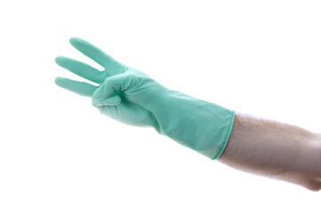 Man's hand in a green glove on hand shows three. Isolated on a white background. 