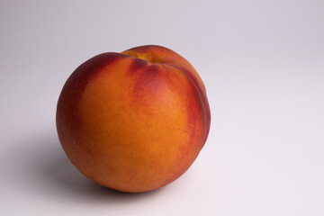 one red fruit turned yellow side close-up