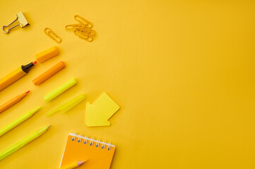 Office stationery supplies, all in yellow tones