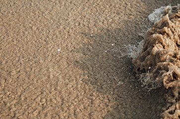 Sea shore, sea waves texture with copy space