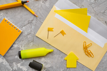 Office stationery supplies in yellow tones