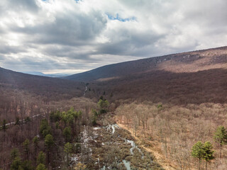 Sunlight breaking through a fleet of passing clouds