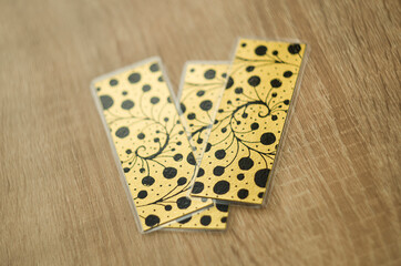 metallic bookmarks on the table
