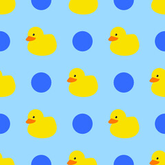 Yellow rubber duck bath time with blue dots seamless repeating background pattern