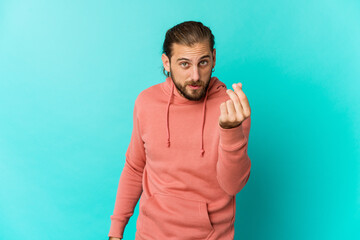 Young man with long hair look showing that she has no money.
