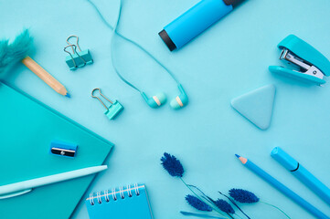 Office stationery supplies in blue tones